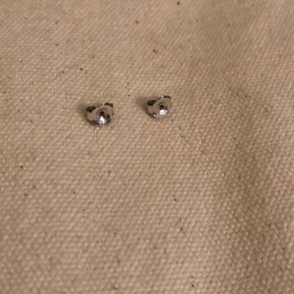 💎 1/10 ct. t.w. Double Halo Diamond Earrings Set in Sterling Silver - Picture 10 of 14